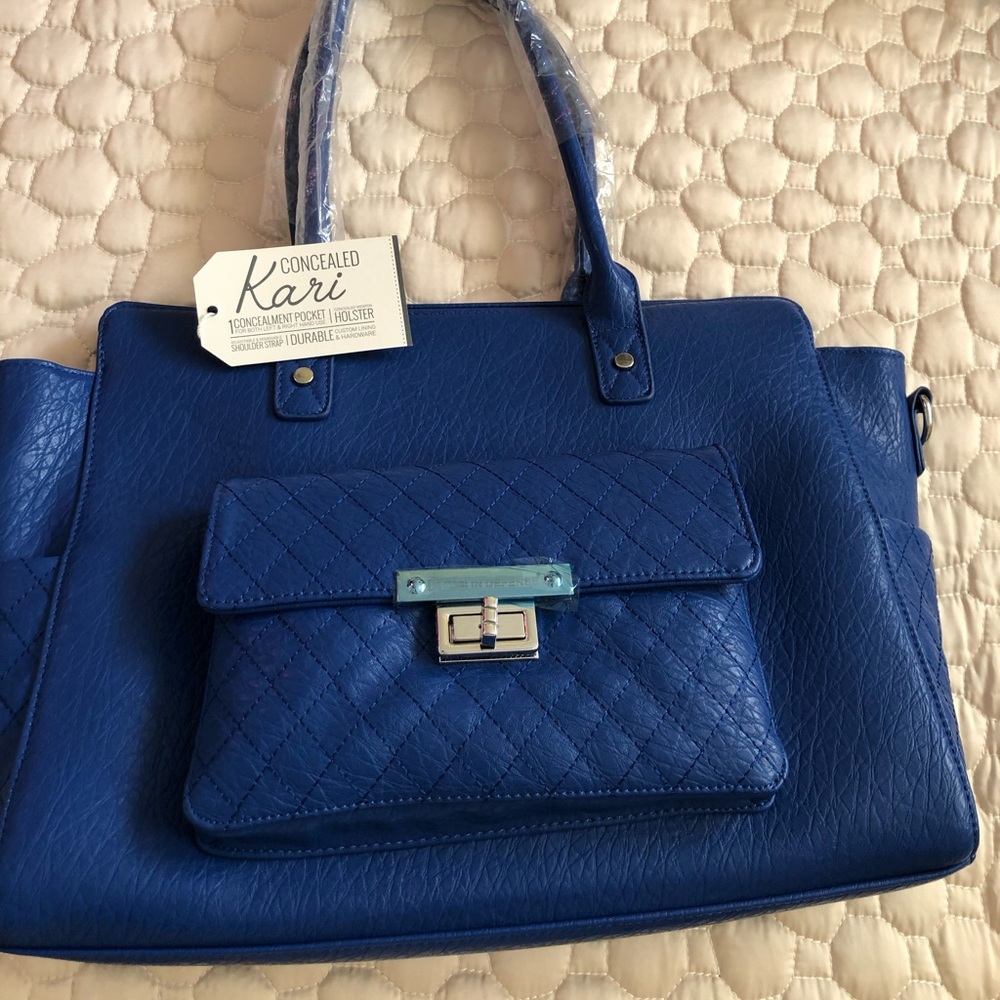 Damsel in Defense ccw purse. NEW with tag
